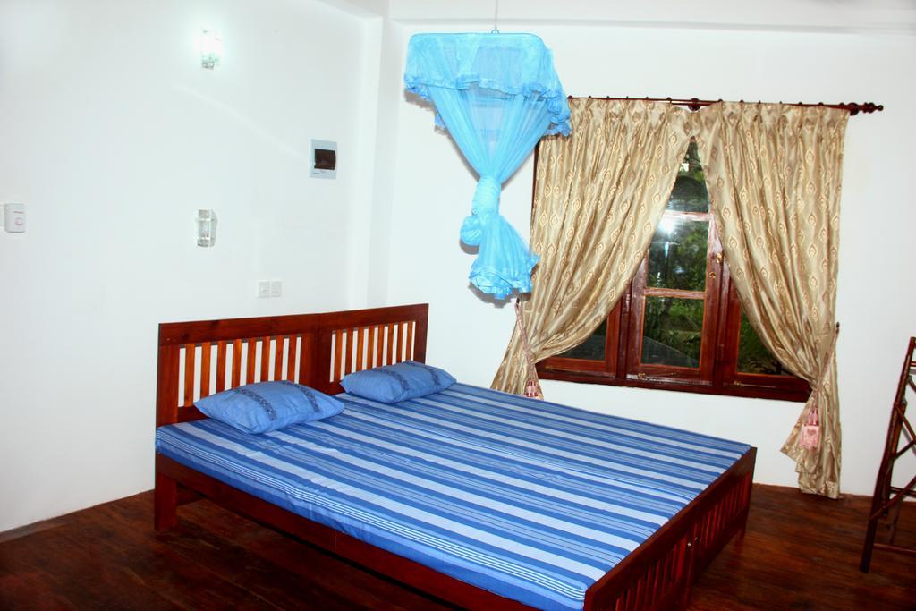 Seasons Four Mini Jungle Cabana Matara Quarto foto